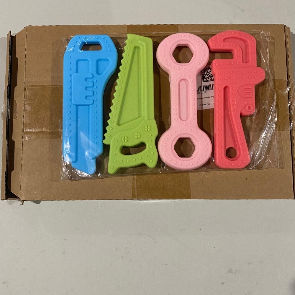 Brand New Set Of 4 Silicone Tool Shaped Teethers For Babies